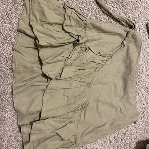 Army green mini skirt with cute tie around the waist